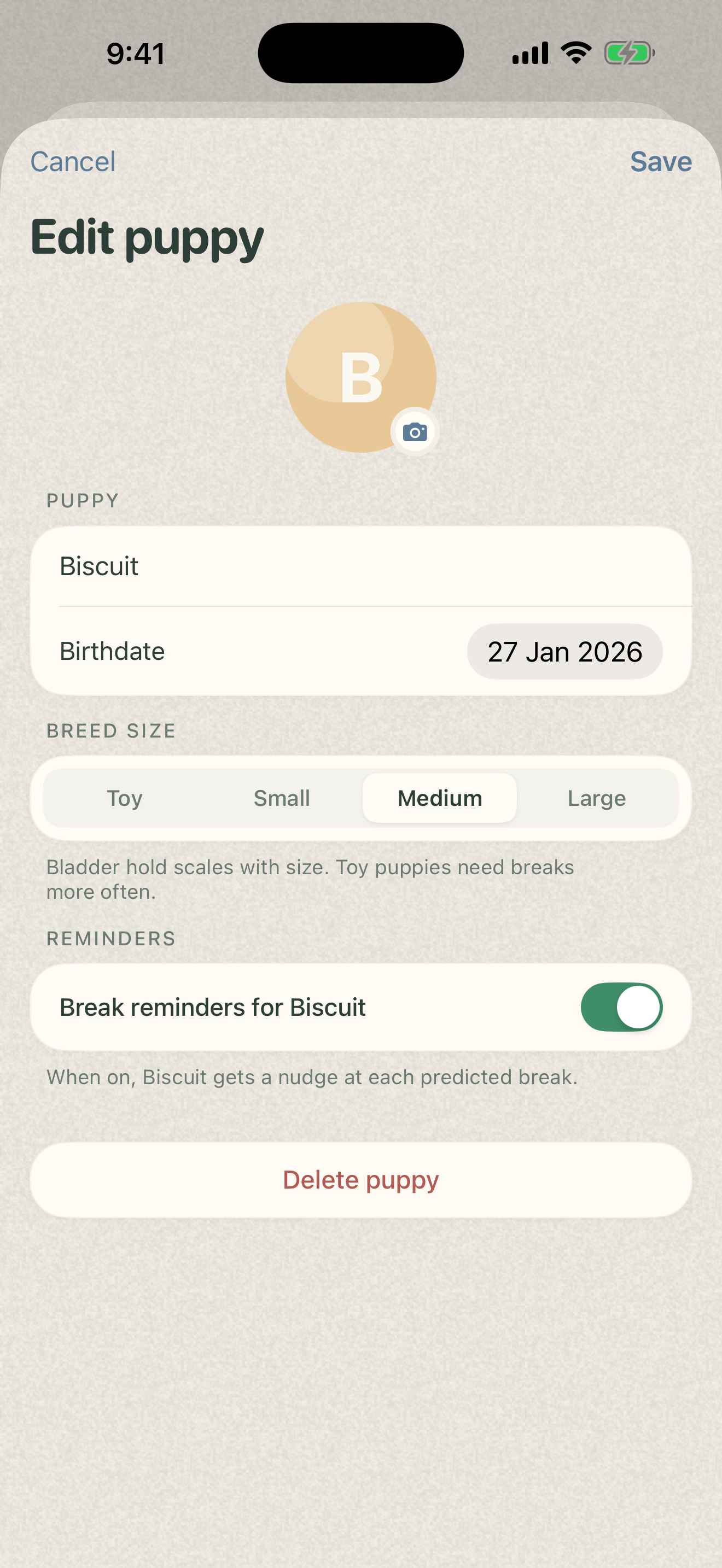 Puddle Edit Puppy sheet with a circular profile photo, name, birthdate, breed-size segmented picker, per-puppy reminders toggle, and a delete option